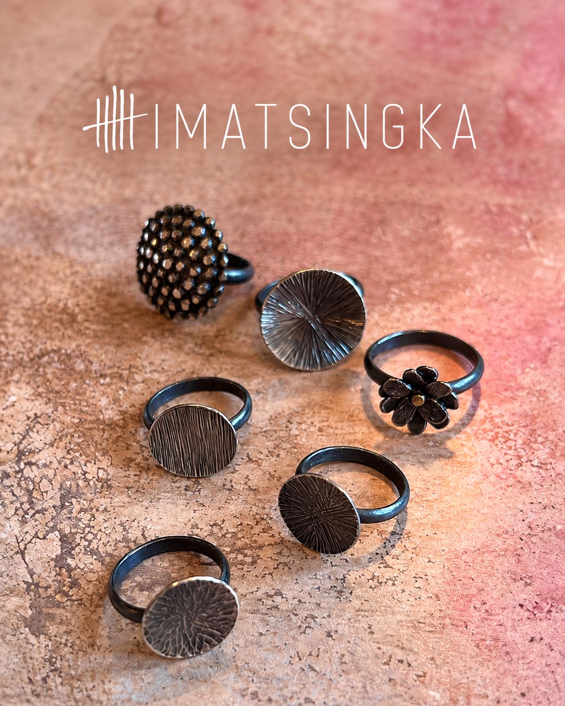 The Himatsingka Dahlia pendant on a hand-painted floral tile
